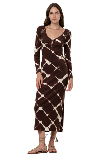 A woman modeling a long-sleeve brown knit dress with a cream tie-dye diamond pattern, featuring a ruched V-neckline, shown against a plain white background.